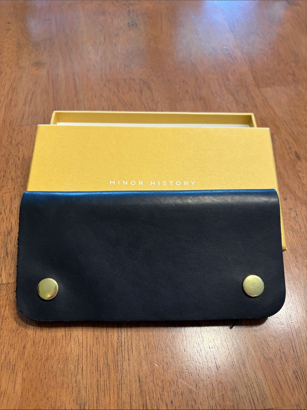 Minor History Black Leather Wallet with Brass Snap Closures